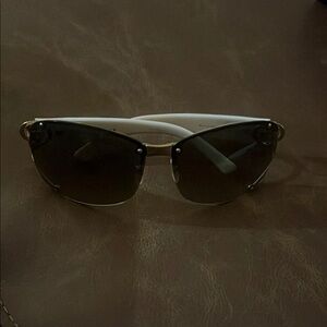 Gucci Black and Gold Rimless Sunglasses
